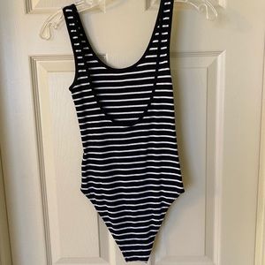 Xs black and white striped bodysuit.